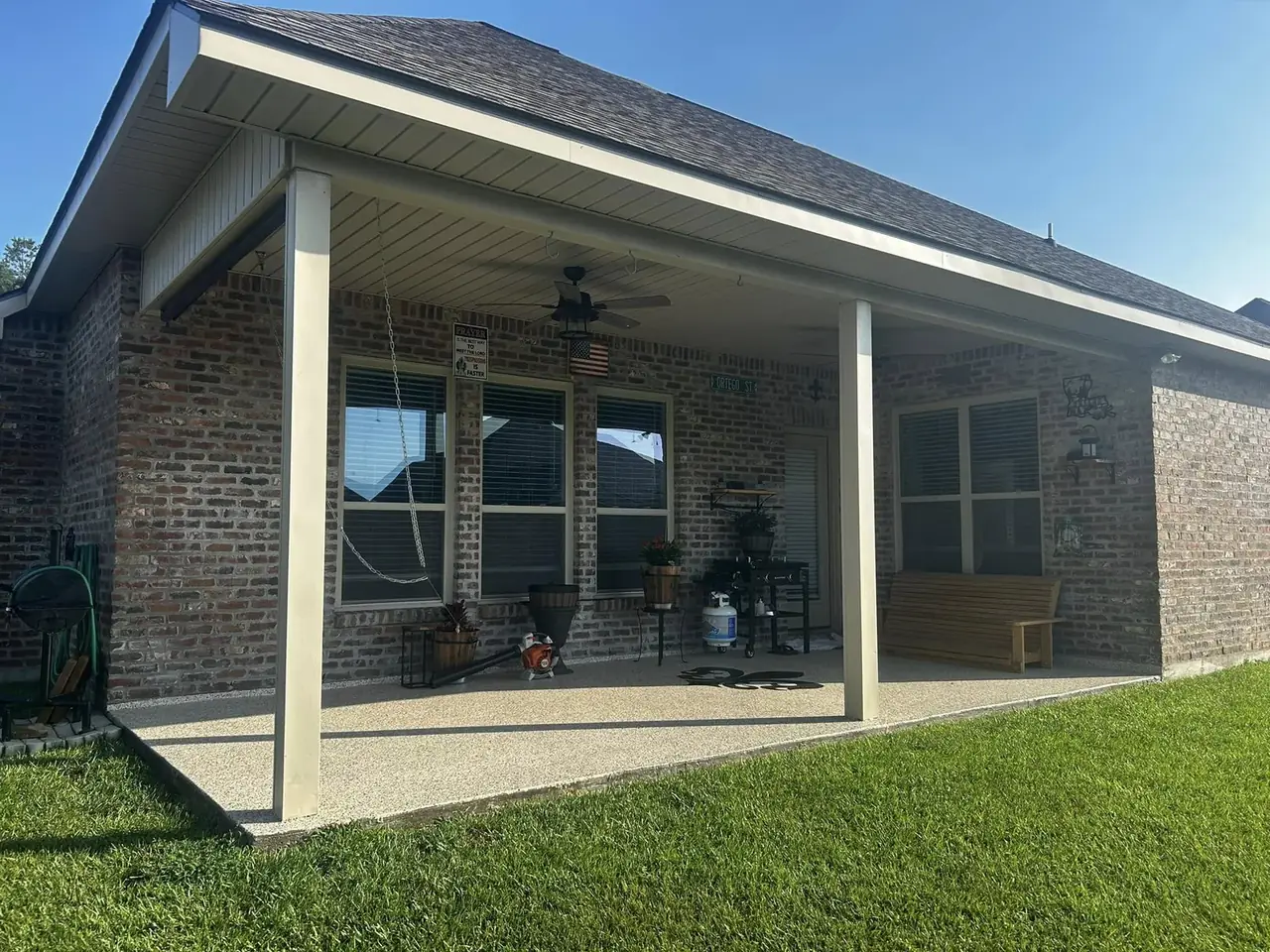 Custom glass room with column detailing on a Baton Rouge area home