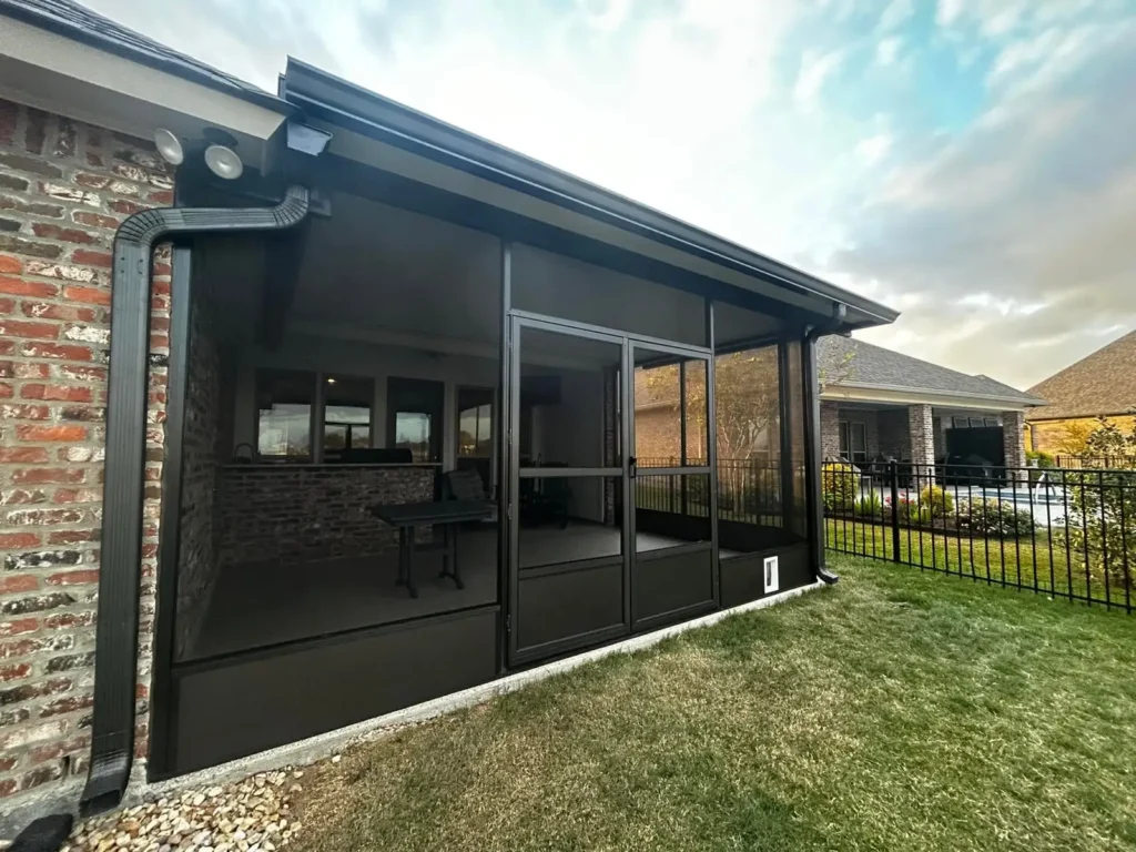 tiger town black screen room brick home metal fence exterior