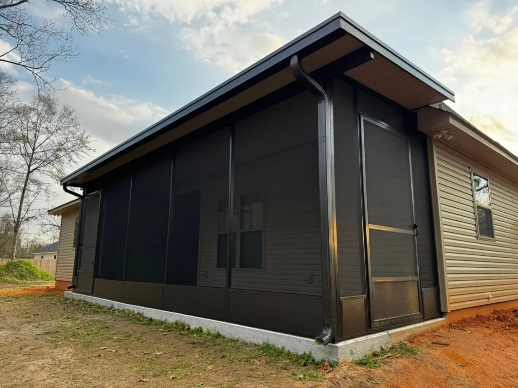 tiger town black screen room tan siding home sunset