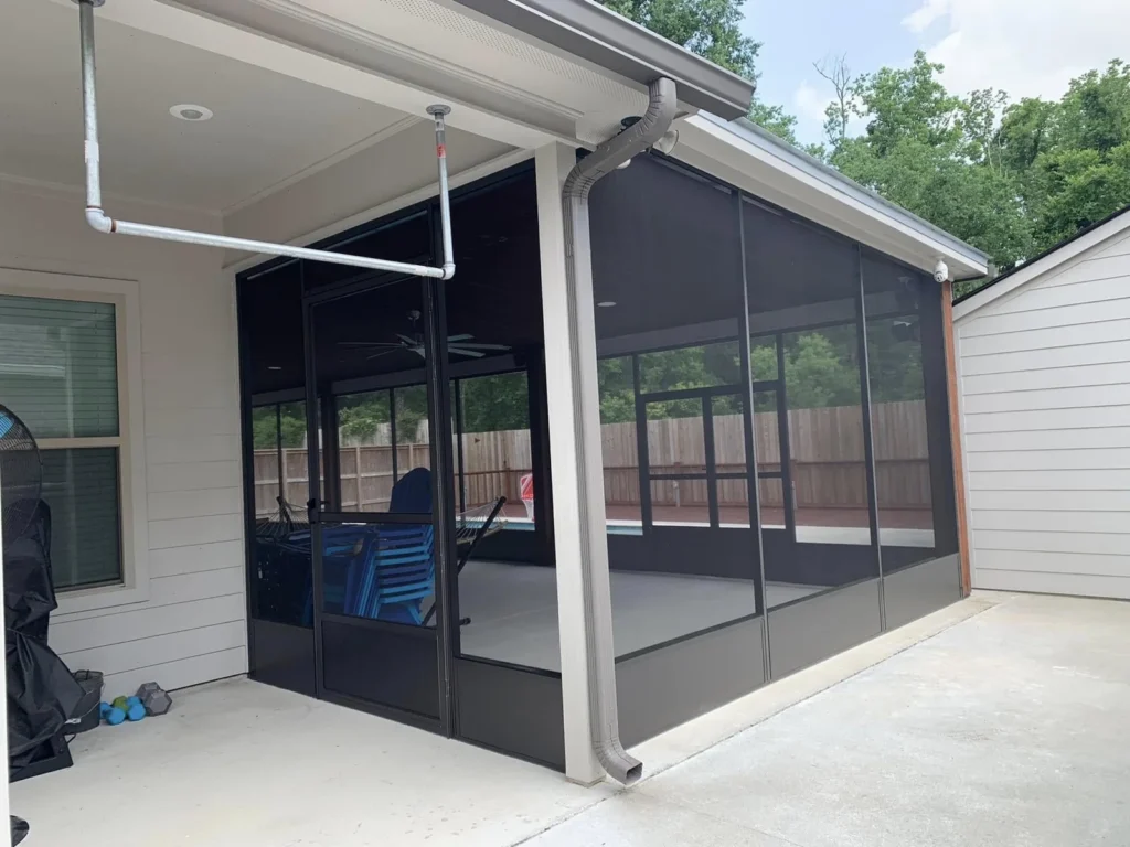 tiger town black screen room white siding home pool