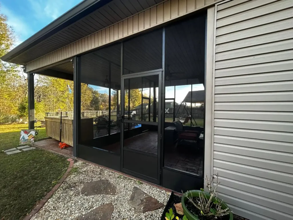 tiger town black screen room white siding home stone path