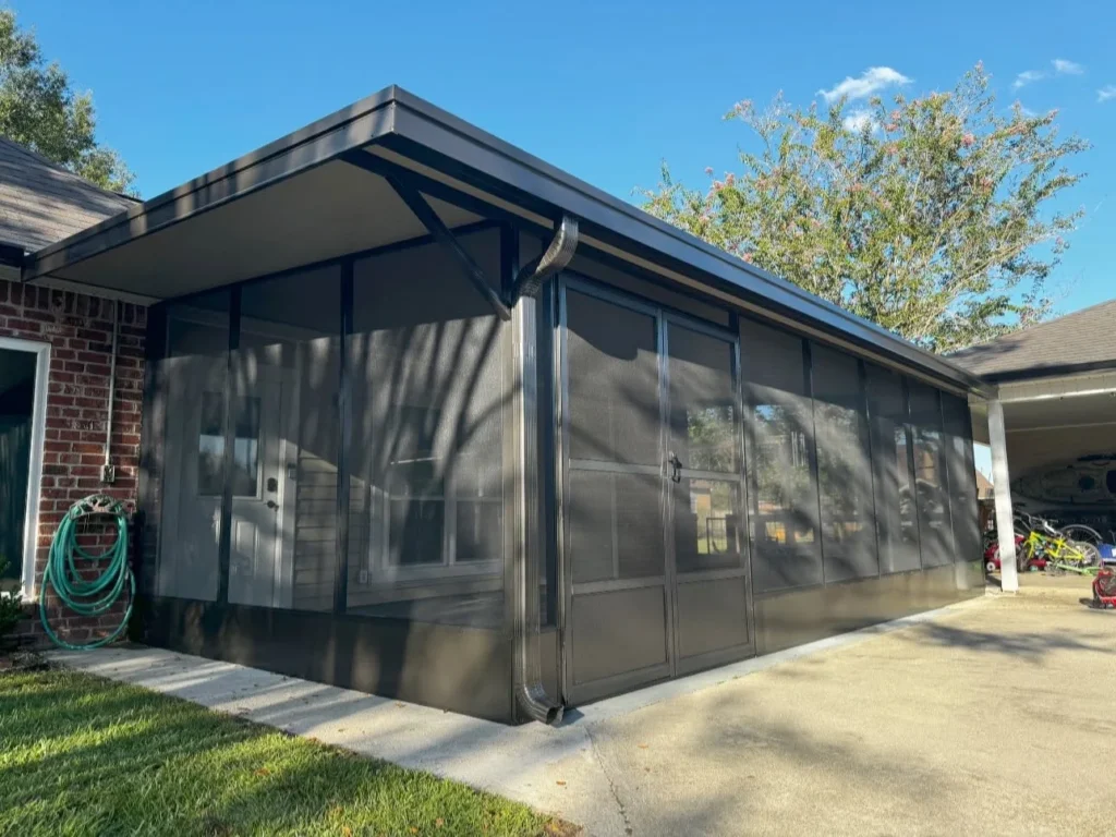 tiger town bronze screen room brick home driveway exterior