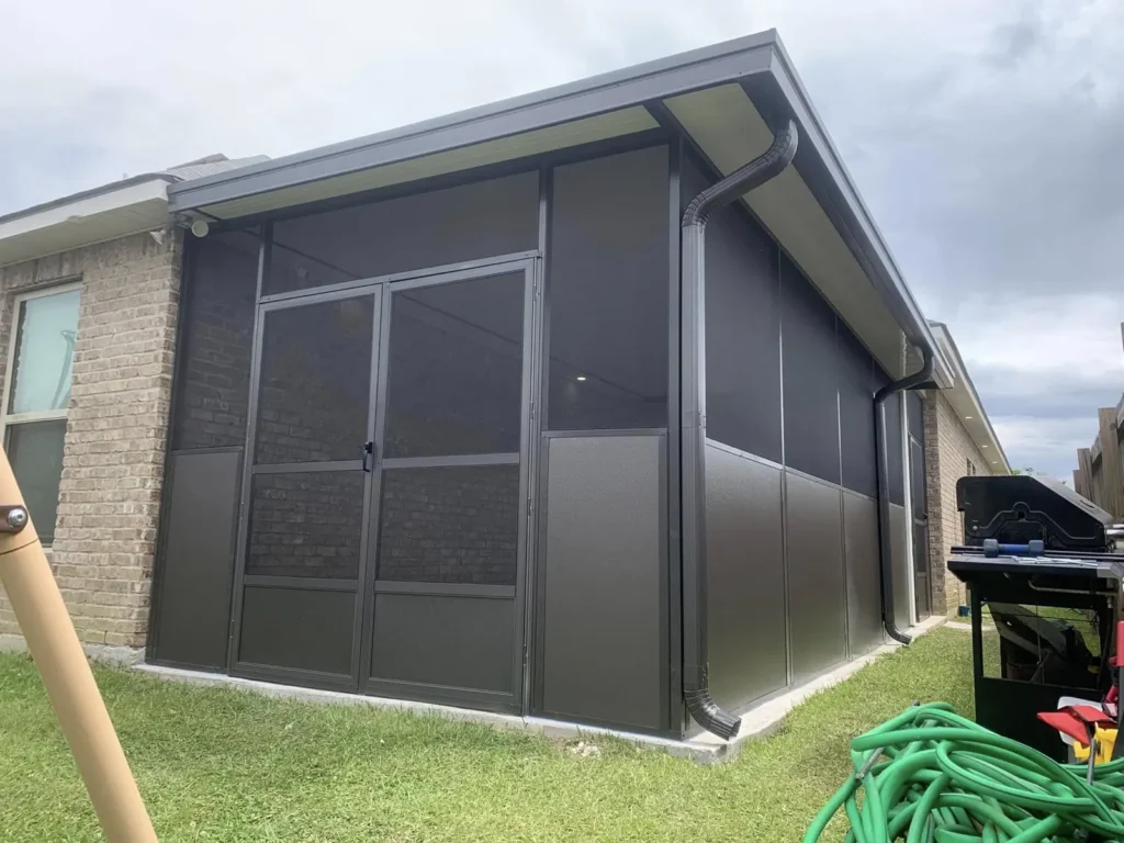 tiger town bronze screen room brick home exterior corner