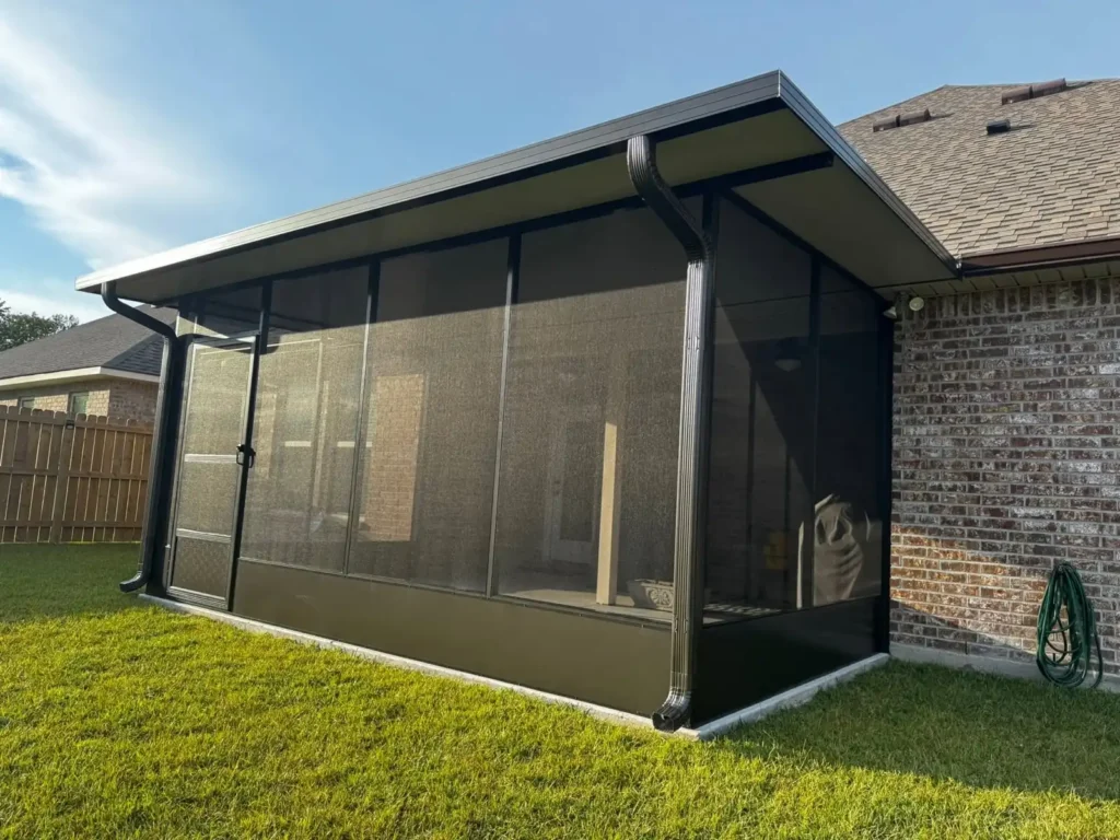 tiger town bronze screen room brick home green lawn exterior