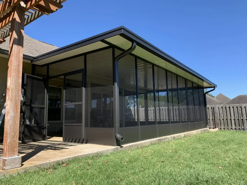 tiger town bronze screen room brick home pergola exterior