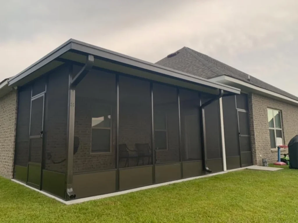 tiger town bronze screen room gray brick home exterior