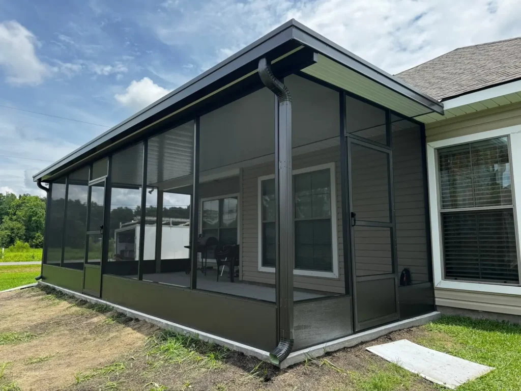 tiger town bronze screen room gray siding home door exterior