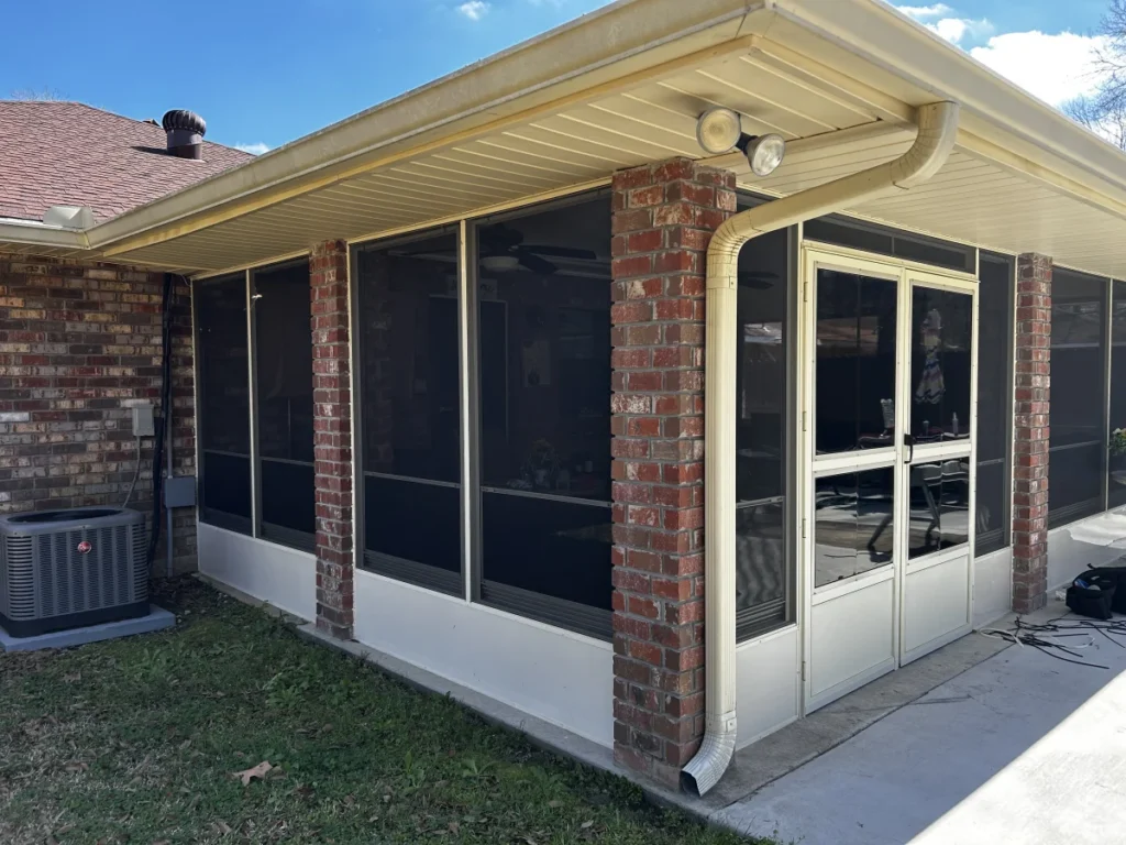 tiger town construction eze breeze room exterior tan screen panels brick columns double door