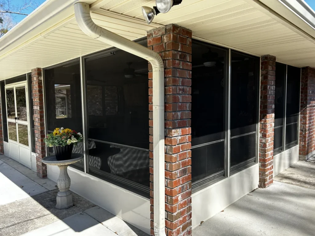 tiger town construction eze breeze room exterior tinted panels brick columns flowers