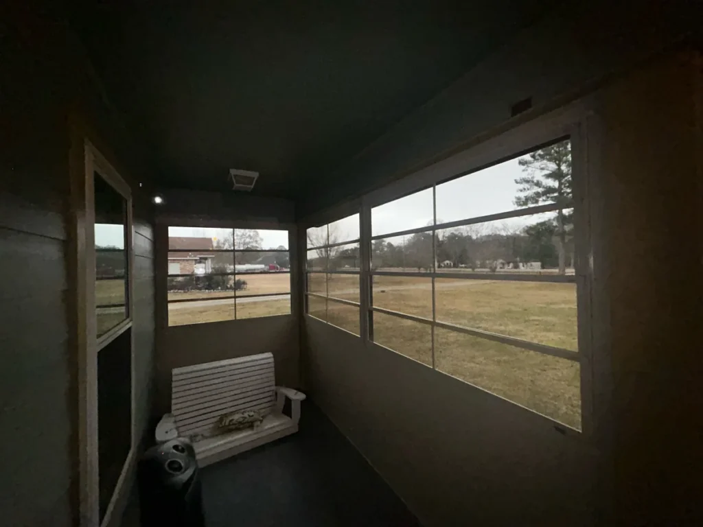 tiger town construction eze breeze room interior dusk porch swing field view