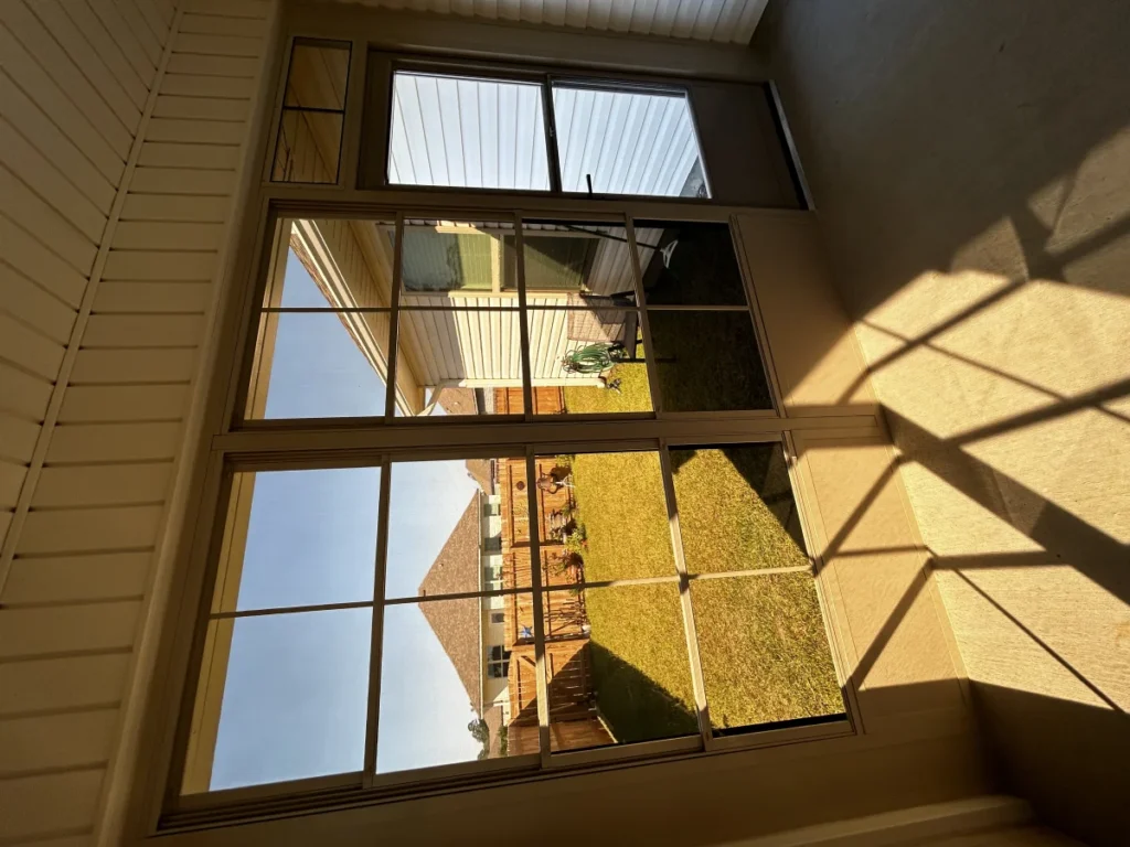 tiger town construction eze breeze room interior transom windows cedar fence view
