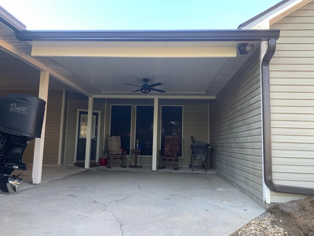 tiger town construction insulated patio cover attached cedar column brick home
