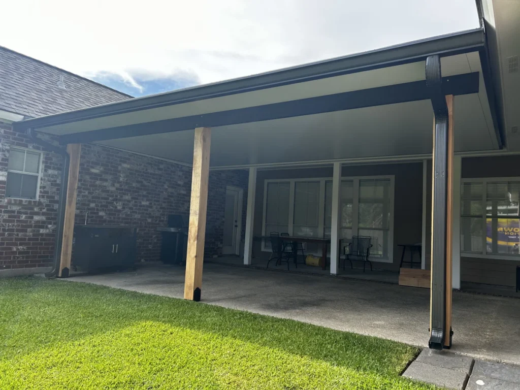 tiger town construction insulated patio cover cedar column brick home cloudy