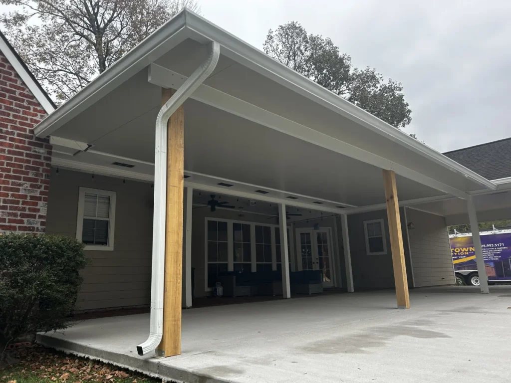 tiger town construction insulated patio cover cedar column truck trailer fall day