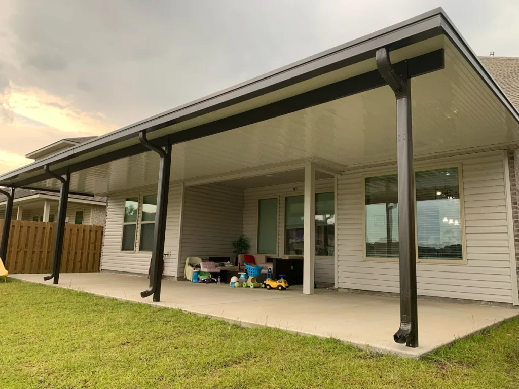 tiger town construction non insulated patio cover bronze frame tan home dusk
