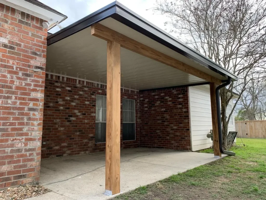 tiger town construction non insulated patio cover cedar column brick home corrugated roof