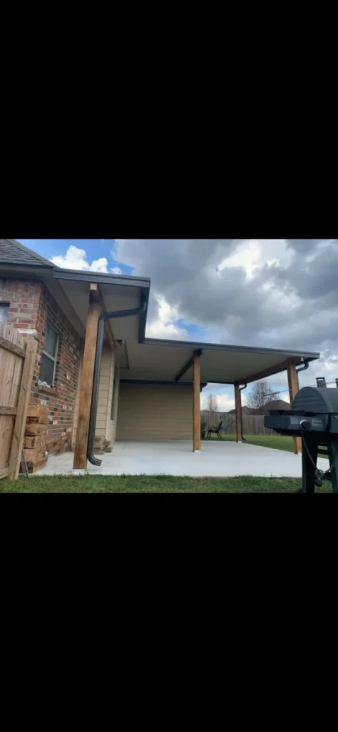 tiger town construction non insulated patio cover cedar columns brick home grill cloudy portrait