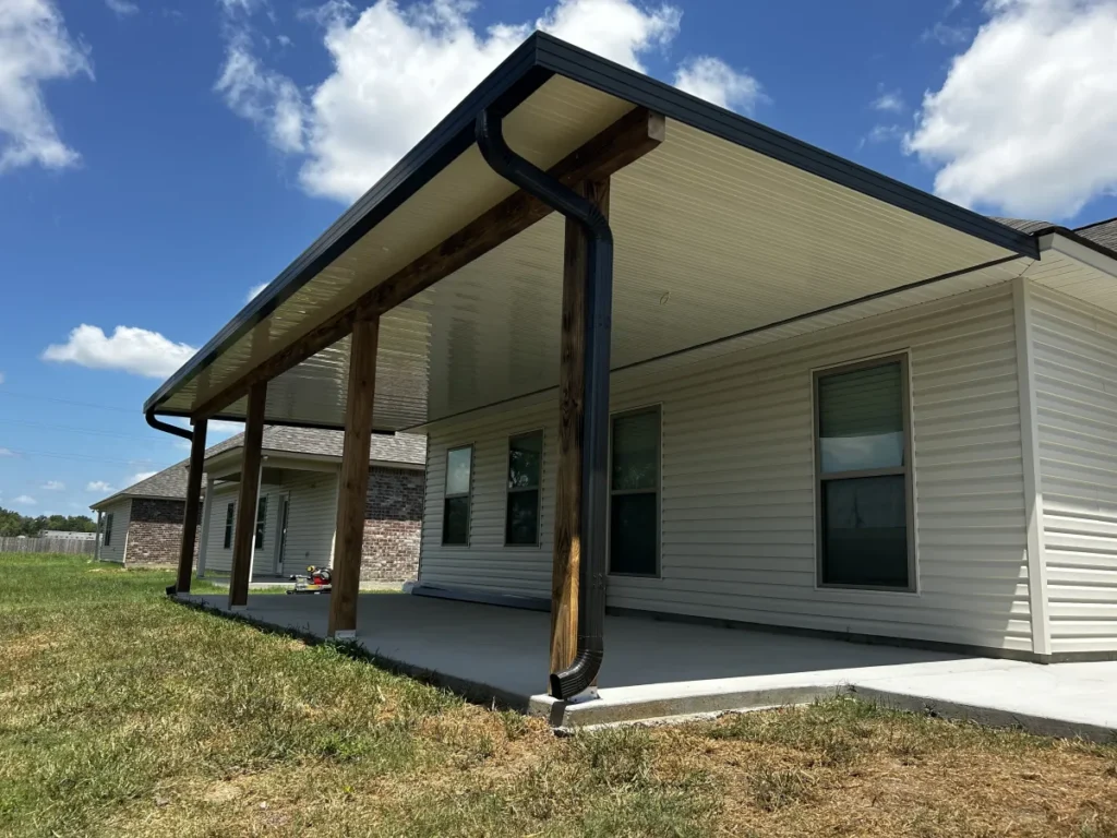 tiger town construction non insulated patio cover cedar columns tan home clear day