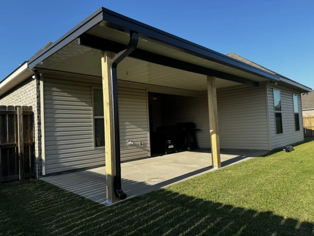tiger town construction non insulated patio cover cedar columns tan home clear day corner